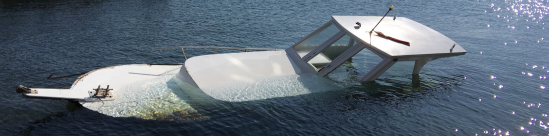 A boating accident that results in a vessel sinking is pictured. 