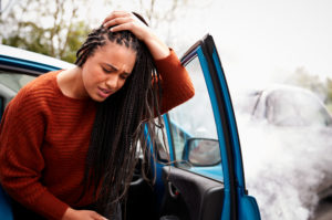 woman with a head injury from a car accident