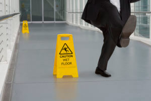 person slipping on wet floor