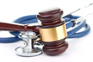 gavel and a stethoscope for person injury case