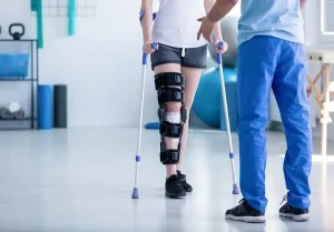 woman in physical therapy for a work injury