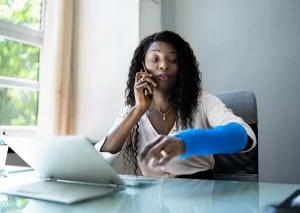 woman with a broken arm from a work injury