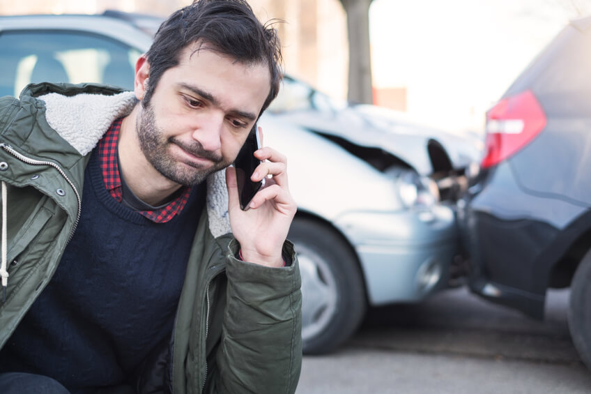 Man calling the insurance company