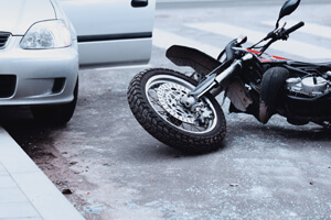 It is worth hiring a motorcycle accident lawyer, even after a minor accident like the one pictured. 