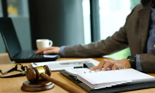 A Vero Beach personal injury lawyer sits in their office.